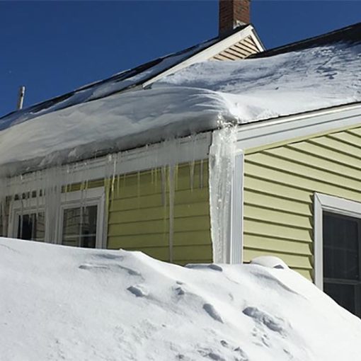 AAA Public Adjusters - Home with snow and ice damage